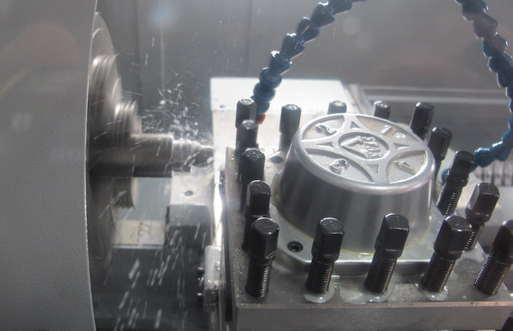 A thread is cut on a shaft by our new CNC lathe.