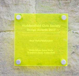A design award plaque from Huddersfield Civic Society on Grove Work, Huddersfield